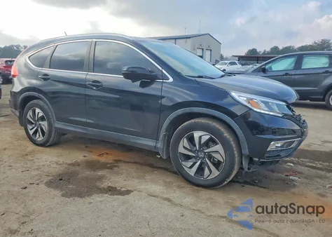 2016 Honda Cr-V Touring z USA, uszkodzony, nr VIN 5J6RM3H9XGL018816